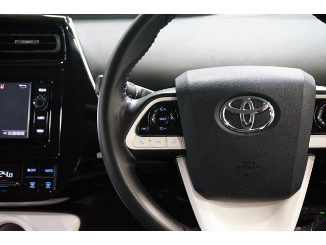 プリウス Sツーリングセレクション 禁煙車 HV車 点検記録簿 黒革シート 7インチナビTV バックカメラ 純正17AW ETC車載器 シートヒーター搭載 CD/DVD再生 Bluetooth接続 アイドリングストップ機能 オートライト(42枚目)