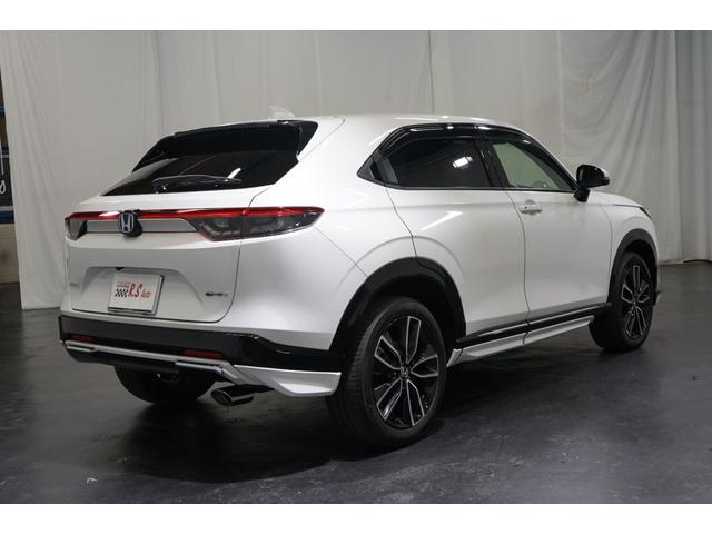 ヴェゼル ｅ：ＨＥＶ　Ｚ　禁煙車　ワンオーナー　９型ナビＴＶ　バックカメラ　衝突軽減ブレーキ　ＣＭＢＳ　レーダークルーズ　ハーフ革　ＥＴＣ　ＣＤ／ＤＶＤ　Ｂｌｕｅｔｏｏｔｈ接続　電動リアゲート　シートヒーター　ホンダセンシング（8枚目）