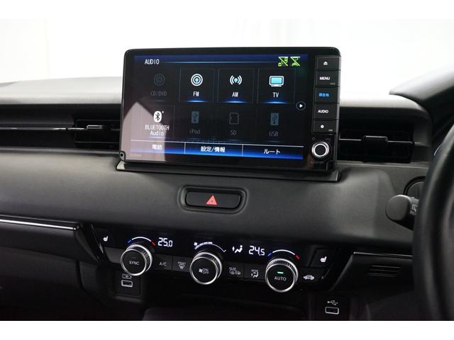 ヴェゼル ｅ：ＨＥＶ　Ｚ　禁煙車　ワンオーナー　９型ナビＴＶ　バックカメラ　衝突軽減ブレーキ　ＣＭＢＳ　レーダークルーズ　ハーフ革　ＥＴＣ　ＣＤ／ＤＶＤ　Ｂｌｕｅｔｏｏｔｈ接続　電動リアゲート　シートヒーター　ホンダセンシング（10枚目）