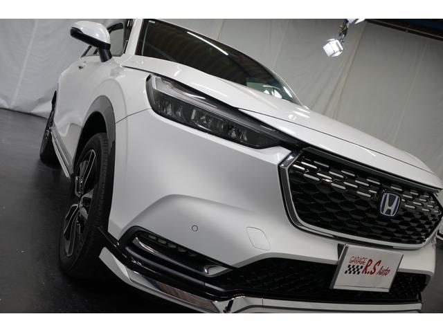ヴェゼル ｅ：ＨＥＶ　Ｚ　禁煙車　ワンオーナー　９型ナビＴＶ　バックカメラ　衝突軽減ブレーキ　ＣＭＢＳ　レーダークルーズ　ハーフ革　ＥＴＣ　ＣＤ／ＤＶＤ　Ｂｌｕｅｔｏｏｔｈ接続　電動リアゲート　シートヒーター　ホンダセンシング（18枚目）