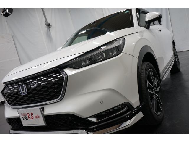 ヴェゼル ｅ：ＨＥＶ　Ｚ　禁煙車　ワンオーナー　９型ナビＴＶ　バックカメラ　衝突軽減ブレーキ　ＣＭＢＳ　レーダークルーズ　ハーフ革　ＥＴＣ　ＣＤ／ＤＶＤ　Ｂｌｕｅｔｏｏｔｈ接続　電動リアゲート　シートヒーター　ホンダセンシング（19枚目）