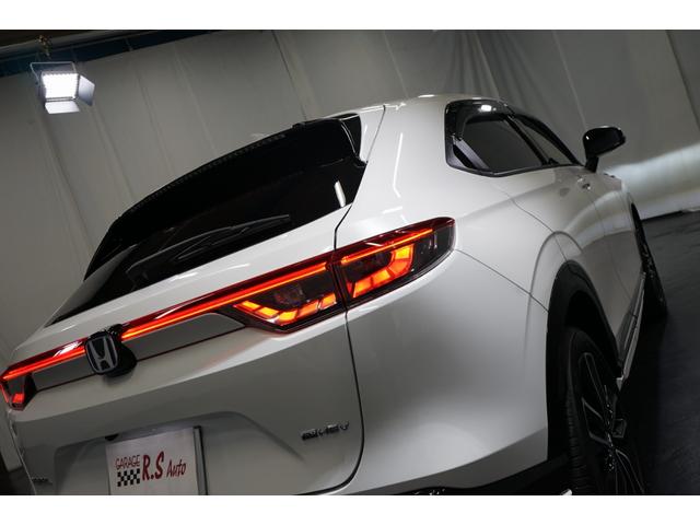 ヴェゼル ｅ：ＨＥＶ　Ｚ　禁煙車　ワンオーナー　９型ナビＴＶ　バックカメラ　衝突軽減ブレーキ　ＣＭＢＳ　レーダークルーズ　ハーフ革　ＥＴＣ　ＣＤ／ＤＶＤ　Ｂｌｕｅｔｏｏｔｈ接続　電動リアゲート　シートヒーター　ホンダセンシング（21枚目）
