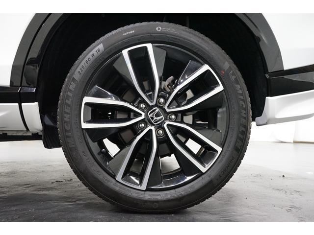 ヴェゼル ｅ：ＨＥＶ　Ｚ　禁煙車　ワンオーナー　９型ナビＴＶ　バックカメラ　衝突軽減ブレーキ　ＣＭＢＳ　レーダークルーズ　ハーフ革　ＥＴＣ　ＣＤ／ＤＶＤ　Ｂｌｕｅｔｏｏｔｈ接続　電動リアゲート　シートヒーター　ホンダセンシング（28枚目）
