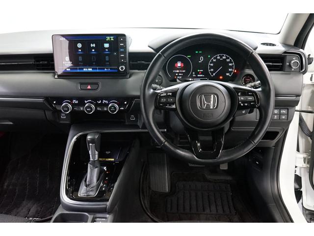 ヴェゼル ｅ：ＨＥＶ　Ｚ　禁煙車　ワンオーナー　９型ナビＴＶ　バックカメラ　衝突軽減ブレーキ　ＣＭＢＳ　レーダークルーズ　ハーフ革　ＥＴＣ　ＣＤ／ＤＶＤ　Ｂｌｕｅｔｏｏｔｈ接続　電動リアゲート　シートヒーター　ホンダセンシング（30枚目）