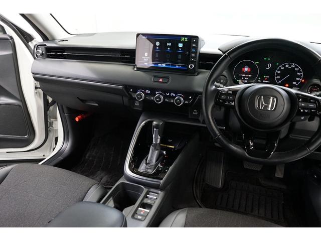 ヴェゼル ｅ：ＨＥＶ　Ｚ　禁煙車　ワンオーナー　９型ナビＴＶ　バックカメラ　衝突軽減ブレーキ　ＣＭＢＳ　レーダークルーズ　ハーフ革　ＥＴＣ　ＣＤ／ＤＶＤ　Ｂｌｕｅｔｏｏｔｈ接続　電動リアゲート　シートヒーター　ホンダセンシング（32枚目）