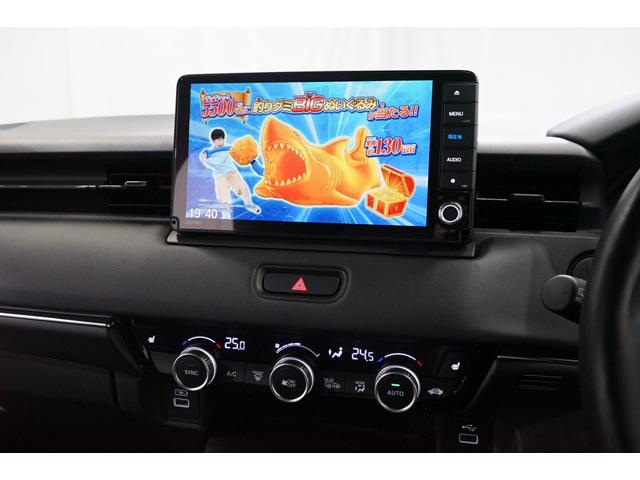 ヴェゼル ｅ：ＨＥＶ　Ｚ　禁煙車　ワンオーナー　９型ナビＴＶ　バックカメラ　衝突軽減ブレーキ　ＣＭＢＳ　レーダークルーズ　ハーフ革　ＥＴＣ　ＣＤ／ＤＶＤ　Ｂｌｕｅｔｏｏｔｈ接続　電動リアゲート　シートヒーター　ホンダセンシング（34枚目）