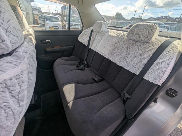 ティーダラティオ スライドアップシート　回転シート　オーテック　レースハーフシートカバー　電動コーナーポール　ワンオーナー　オートライト　オートエアコン（4枚目）