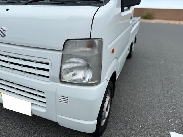 キャリイトラック KCエアコン・パワステ 4WD 5速マニュアル エアコン パワステ 3方開 ゲートプロテクター 荷台マット ヘッドライトレベライザー FM/AMラジオチューナー(24枚目)