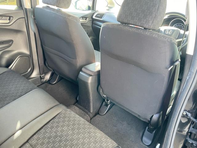 フィット １３Ｇ・Ｆパッケージ　コンフォートエディション　特別仕様車　あんしんパッケージ／車検２年整備付／オートリトラミラー／ナビ／ＤＴＶ／Ｂｌｕｅｔｏｏｔｈ／ＤＶＤ／シートヒーター／プラズマクラスターオートエアコン／ワンオーナー／禁煙車（53枚目）