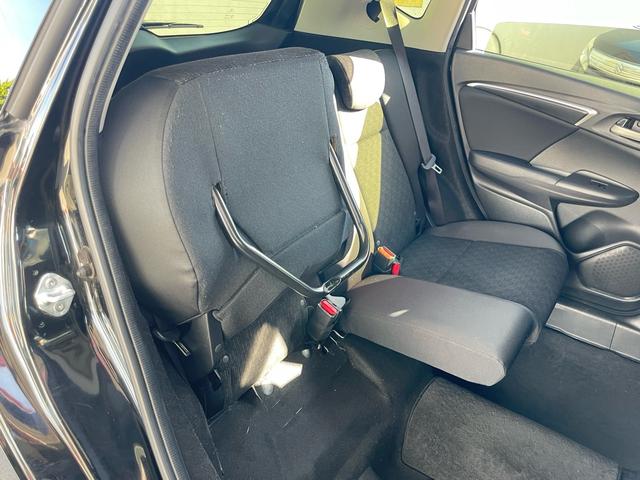 フィット １３Ｇ・Ｆパッケージ　コンフォートエディション　特別仕様車　あんしんパッケージ／車検２年整備付／オートリトラミラー／ナビ／ＤＴＶ／Ｂｌｕｅｔｏｏｔｈ／ＤＶＤ／シートヒーター／プラズマクラスターオートエアコン／ワンオーナー／禁煙車（54枚目）