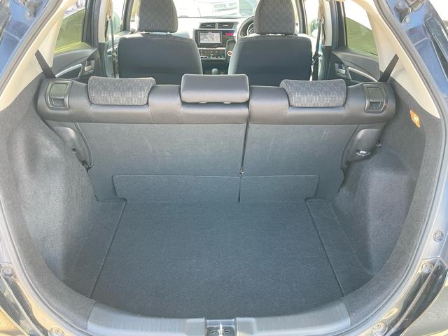 フィット １３Ｇ・Ｆパッケージ　コンフォートエディション　特別仕様車　あんしんパッケージ／車検２年整備付／オートリトラミラー／ナビ／ＤＴＶ／Ｂｌｕｅｔｏｏｔｈ／ＤＶＤ／シートヒーター／プラズマクラスターオートエアコン／ワンオーナー／禁煙車（59枚目）