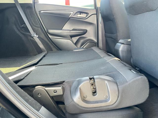 フィット １３Ｇ・Ｆパッケージ　コンフォートエディション　特別仕様車　あんしんパッケージ／車検２年整備付／オートリトラミラー／ナビ／ＤＴＶ／Ｂｌｕｅｔｏｏｔｈ／ＤＶＤ／シートヒーター／プラズマクラスターオートエアコン／ワンオーナー／禁煙車（62枚目）