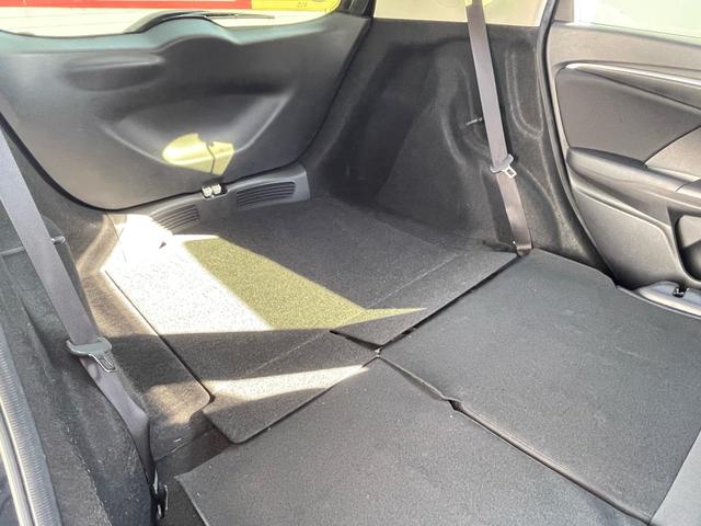 フィット １３Ｇ・Ｆパッケージ　コンフォートエディション　特別仕様車　あんしんパッケージ／車検２年整備付／オートリトラミラー／ナビ／ＤＴＶ／Ｂｌｕｅｔｏｏｔｈ／ＤＶＤ／シートヒーター／プラズマクラスターオートエアコン／ワンオーナー／禁煙車（63枚目）