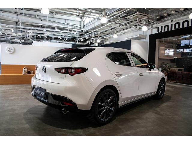 ＭＡＺＤＡ３ファストバック ２０Ｓプロアクティブ　ツーリングセレクション　登録済未使用車　ＢＯＳＥサウンドシステム　バーガンディレザーＰ　３６０°ビューモニター　シートヒーター　ステアリングヒーター　パワーシート　クルーズコントロール　純正１８インチアルミ　ワイヤレス充電（56枚目）