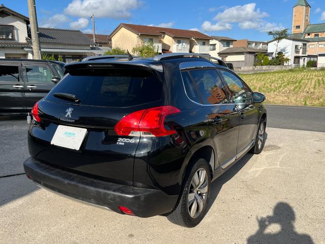 ２００８ 　純正ナビ　バックソナー　ＥＴＣ　ブルーライオン　ＳＵＶ　ボディ別色ルーフレール　スキッドガード　純正アルミホイール　スペアタイヤ　荷台フラット　スマートキー（9枚目）
