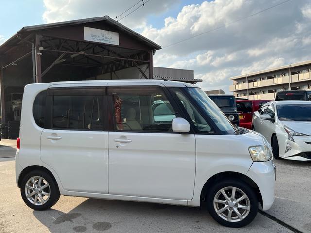 タント Ｌ　ワンオーナー　純正アルミ　コインポケット　リア席フラット　スライドドア　純正オーディオ　ハイトワゴン　アームレストコンソール　ドリンクホルダー　エアコン　パワステ　キーレス　スペアキー　保証書（7枚目）