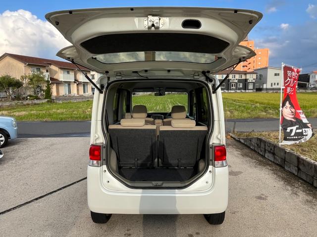 タント Ｌ　ワンオーナー　純正アルミ　コインポケット　リア席フラット　スライドドア　純正オーディオ　ハイトワゴン　アームレストコンソール　ドリンクホルダー　エアコン　パワステ　キーレス　スペアキー　保証書（10枚目）