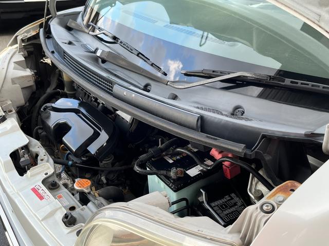 タント Ｌ　ワンオーナー　純正アルミ　コインポケット　リア席フラット　スライドドア　純正オーディオ　ハイトワゴン　アームレストコンソール　ドリンクホルダー　エアコン　パワステ　キーレス　スペアキー　保証書（13枚目）