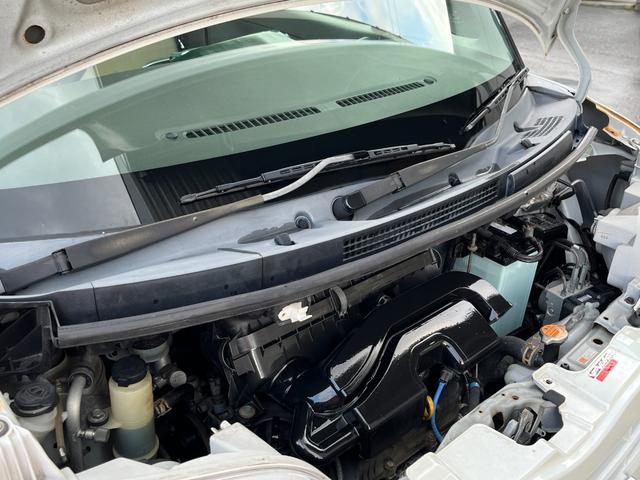 タント Ｌ　ワンオーナー　純正アルミ　コインポケット　リア席フラット　スライドドア　純正オーディオ　ハイトワゴン　アームレストコンソール　ドリンクホルダー　エアコン　パワステ　キーレス　スペアキー　保証書（15枚目）