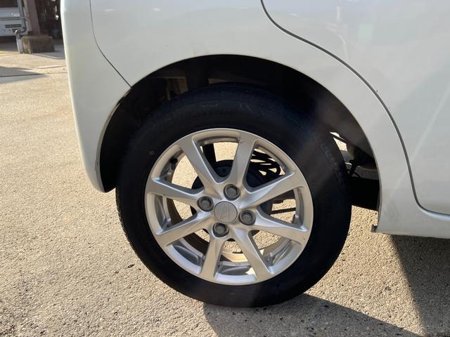 タント Ｌ　ワンオーナー　純正アルミ　コインポケット　リア席フラット　スライドドア　純正オーディオ　ハイトワゴン　アームレストコンソール　ドリンクホルダー　エアコン　パワステ　キーレス　スペアキー　保証書（18枚目）