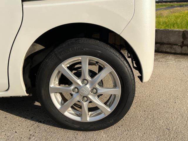 タント Ｌ　ワンオーナー　純正アルミ　コインポケット　リア席フラット　スライドドア　純正オーディオ　ハイトワゴン　アームレストコンソール　ドリンクホルダー　エアコン　パワステ　キーレス　スペアキー　保証書（19枚目）