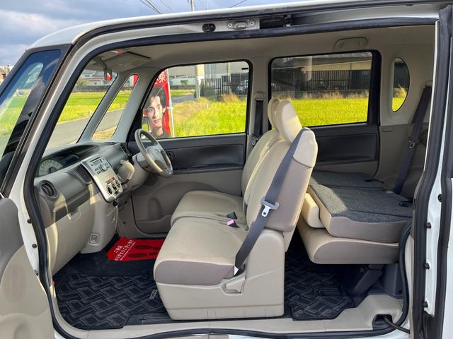 タント Ｌ　ワンオーナー　純正アルミ　コインポケット　リア席フラット　スライドドア　純正オーディオ　ハイトワゴン　アームレストコンソール　ドリンクホルダー　エアコン　パワステ　キーレス　スペアキー　保証書（33枚目）