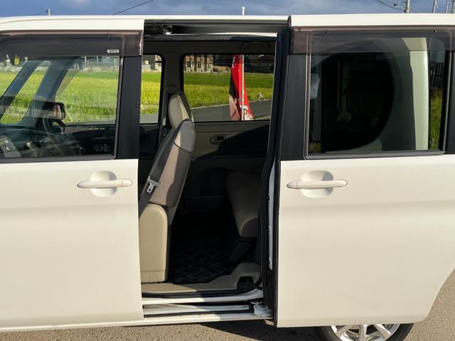 タント Ｌ　ワンオーナー　純正アルミ　コインポケット　リア席フラット　スライドドア　純正オーディオ　ハイトワゴン　アームレストコンソール　ドリンクホルダー　エアコン　パワステ　キーレス　スペアキー　保証書（37枚目）