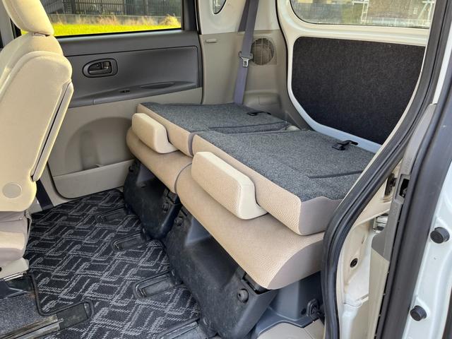 タント Ｌ　ワンオーナー　純正アルミ　コインポケット　リア席フラット　スライドドア　純正オーディオ　ハイトワゴン　アームレストコンソール　ドリンクホルダー　エアコン　パワステ　キーレス　スペアキー　保証書（41枚目）