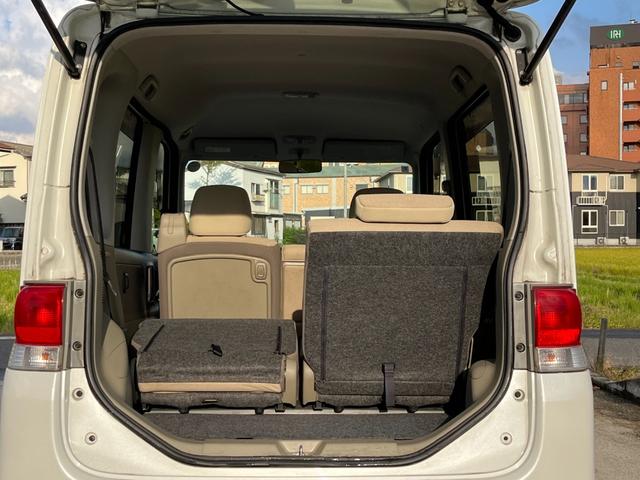 タント Ｌ　ワンオーナー　純正アルミ　コインポケット　リア席フラット　スライドドア　純正オーディオ　ハイトワゴン　アームレストコンソール　ドリンクホルダー　エアコン　パワステ　キーレス　スペアキー　保証書（48枚目）