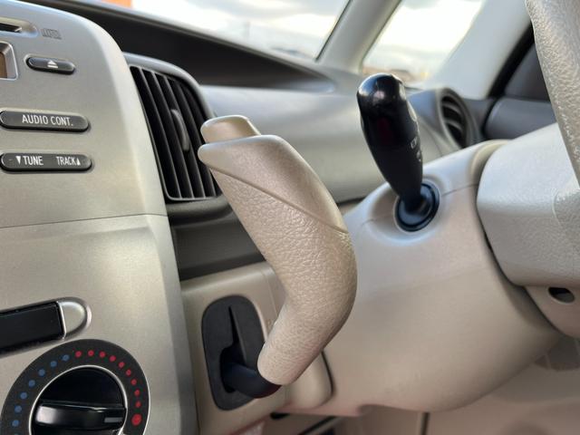 タント Ｌ　ワンオーナー　純正アルミ　コインポケット　リア席フラット　スライドドア　純正オーディオ　ハイトワゴン　アームレストコンソール　ドリンクホルダー　エアコン　パワステ　キーレス　スペアキー　保証書（52枚目）