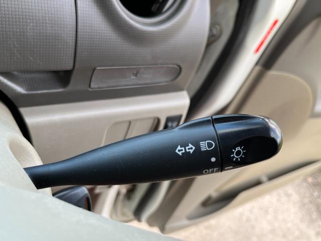 タント Ｌ　ワンオーナー　純正アルミ　コインポケット　リア席フラット　スライドドア　純正オーディオ　ハイトワゴン　アームレストコンソール　ドリンクホルダー　エアコン　パワステ　キーレス　スペアキー　保証書（55枚目）