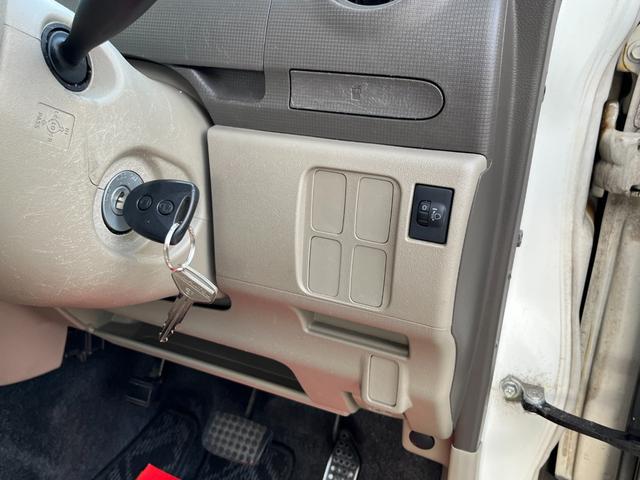 タント Ｌ　ワンオーナー　純正アルミ　コインポケット　リア席フラット　スライドドア　純正オーディオ　ハイトワゴン　アームレストコンソール　ドリンクホルダー　エアコン　パワステ　キーレス　スペアキー　保証書（56枚目）