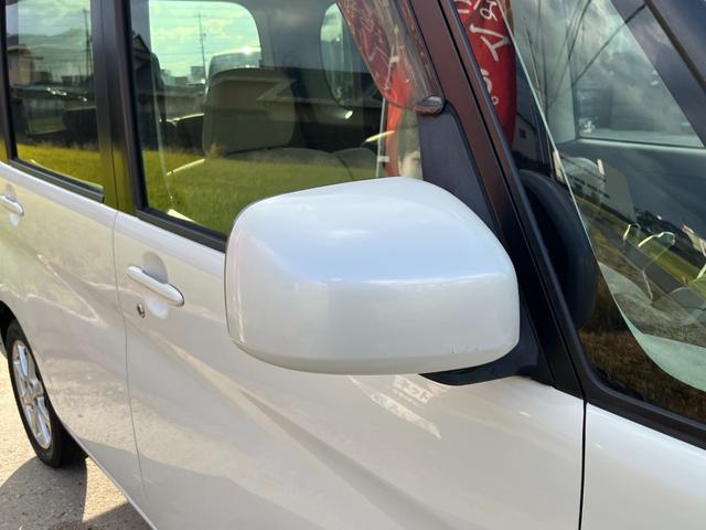 タント Ｌ　ワンオーナー　純正アルミ　コインポケット　リア席フラット　スライドドア　純正オーディオ　ハイトワゴン　アームレストコンソール　ドリンクホルダー　エアコン　パワステ　キーレス　スペアキー　保証書（76枚目）