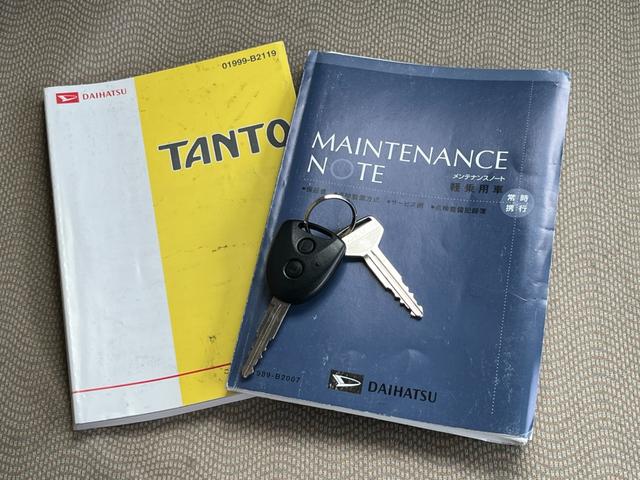 タント Ｌ　ワンオーナー　純正アルミ　コインポケット　リア席フラット　スライドドア　純正オーディオ　ハイトワゴン　アームレストコンソール　ドリンクホルダー　エアコン　パワステ　キーレス　スペアキー　保証書（78枚目）