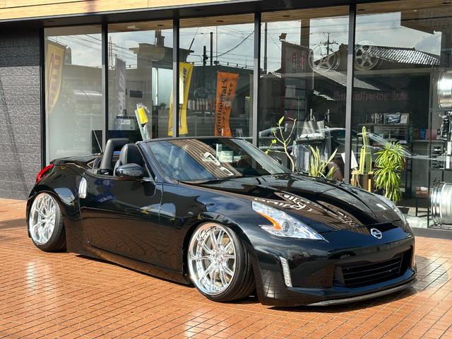 フェアレディZ ロードスターバージョンST エアフォースエアサス ヴァラマンディ19インチ T-demandeフルアーム T-demande前後ビッグブレーキ フロントカーボンリップ チタンエキゾースト NR-Gステアリング pivotスロコン(2枚目)