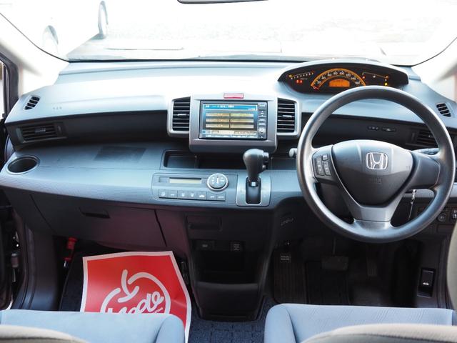 フリード Ｇ　Ｌパッケージ　純正ナビ　バックカメラ　電動スライドドア　ＥＴＣ　ワンオーナー　キーレスキー　純正ホイールキャップ　電動格納ミラー　ステアリングスイッチ　ウィンカーミラー（7枚目）