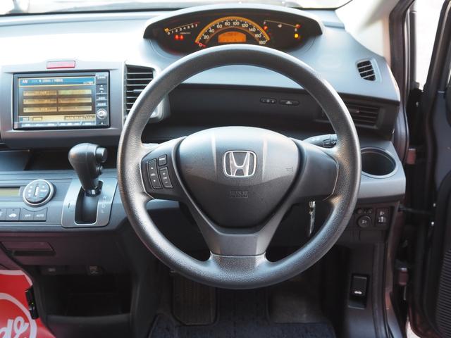 フリード Ｇ　Ｌパッケージ　純正ナビ　バックカメラ　電動スライドドア　ＥＴＣ　ワンオーナー　キーレスキー　純正ホイールキャップ　電動格納ミラー　ステアリングスイッチ　ウィンカーミラー（8枚目）