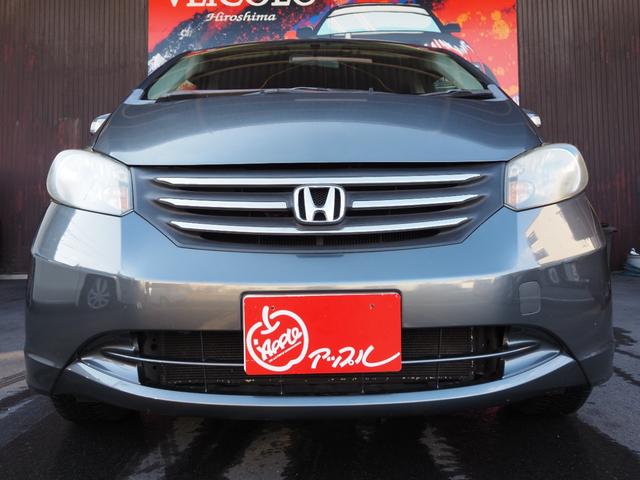 フリード Ｇ　Ｌパッケージ　純正ナビ　バックカメラ　電動スライドドア　ＥＴＣ　ワンオーナー　キーレスキー　純正ホイールキャップ　電動格納ミラー　ステアリングスイッチ　ウィンカーミラー（18枚目）