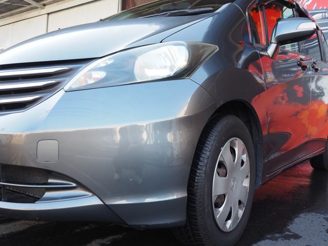 フリード Ｇ　Ｌパッケージ　純正ナビ　バックカメラ　電動スライドドア　ＥＴＣ　ワンオーナー　キーレスキー　純正ホイールキャップ　電動格納ミラー　ステアリングスイッチ　ウィンカーミラー（20枚目）