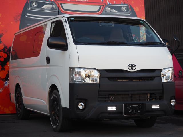 ハイエースバン ロングDX 純正ナビ ワンセグ バックカメラ レザー調シートカバー LEDヘッドライト 社外15インチアルミホイール ホワイトレター ETC キーレスキー 9人乗り(3枚目)