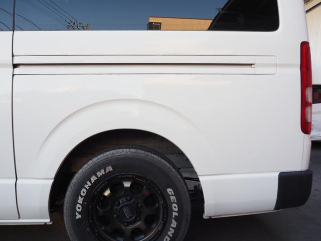 ハイエースバン ロングDX 純正ナビ ワンセグ バックカメラ レザー調シートカバー LEDヘッドライト 社外15インチアルミホイール ホワイトレター ETC キーレスキー 9人乗り(27枚目)