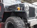 キャンバストップ　マッドテレーンタイヤ　４速ミッション　ＭＴ　４ＷＤ　ｍｏｍｏハンドル　レザー調シートカバー　ＲＡＮＣＨＯ／ＲＳ５０００ショックアブソーバー　Ｊ５８　１ナンバー登録（30枚目）