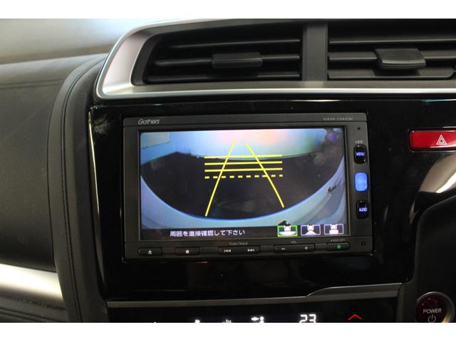 フィットハイブリッド Fパッケージ コンフォートエディション 純正ナビ ワンセグTV BT Bカメラ ETC 両シートヒーター スマートキー オートエアコン プライバシーガラス ドアバイザー(5枚目)