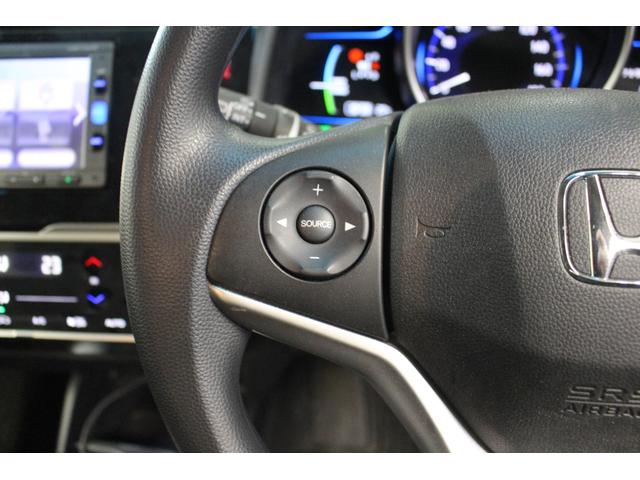 フィットハイブリッド Fパッケージ コンフォートエディション 純正ナビ ワンセグTV BT Bカメラ ETC 両シートヒーター スマートキー オートエアコン プライバシーガラス ドアバイザー(6枚目)