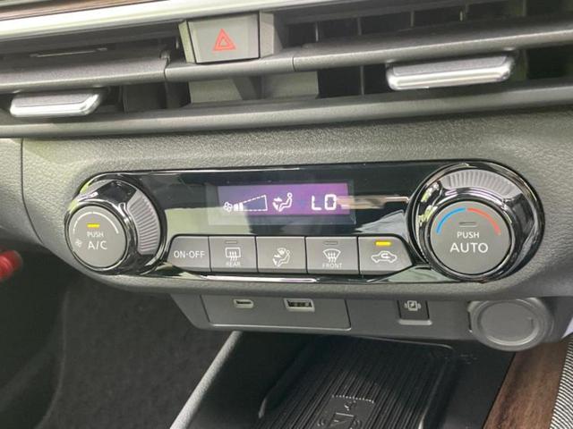 オーラ Ｇレザーエディション　ＢＯＳＥ／保証書／純正　９インチ　ＳＤナビ／インテリジェントルームミラー／衝突安全装置／全方位モニター／車線逸脱防止支援システム／シート　フルレザー／プロパイロット　革シート　衝突被害軽減システム（32枚目）