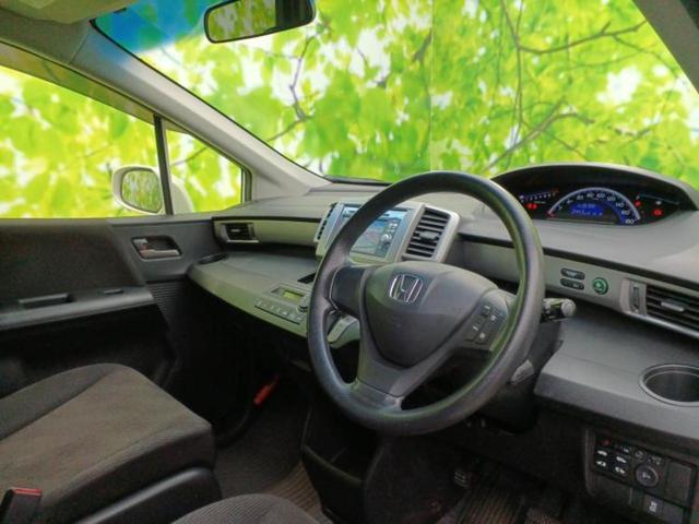 フリード Gジャストセレクション 純正 SDナビ/両側電動スライドドア/ヘッドランプ HID/ETC/EBD付ABS/横滑り防止装置/ワンセグTV/パワーウインドウ/エンジンスタートボタン/キーレスエントリー/オートエアコン(4枚目)