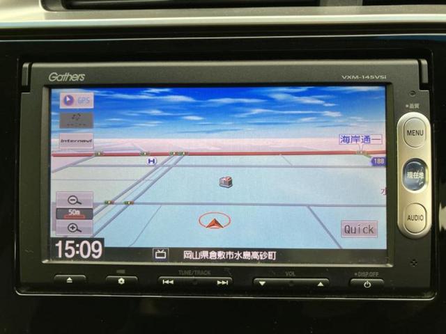 フィット 13G・Sパッケージ 純正 SDナビ/ヘッドランプ HID/ETC/EBD付ABS/横滑り防止装置/アイドリングストップ/ワンセグTV/エアバッグ 運転席/エアバッグ 助手席/MTモード付き HIDヘッドライト(9枚目)