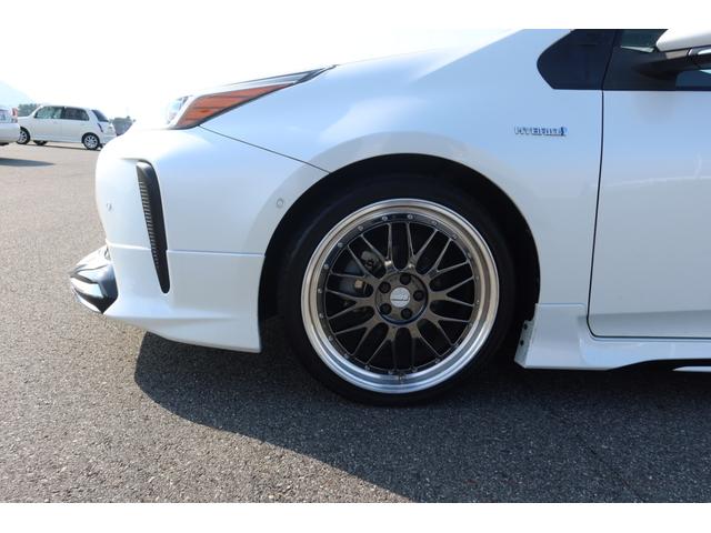 プリウス Aプレミアム 禁煙車 限定BBS19inホイール モデリスタエアロ サンルーフ 本革シート 9型ナビ バックカメラ ETC 前後ドライブレコーダー レーダークルーズ クリアランスソナー オートハイビーム 安全装備(21枚目)