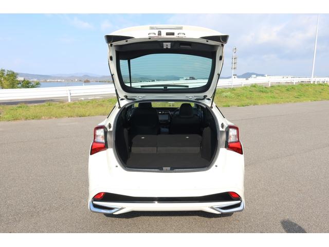 プリウス Aプレミアム 禁煙車 限定BBS19inホイール モデリスタエアロ サンルーフ 本革シート 9型ナビ バックカメラ ETC 前後ドライブレコーダー レーダークルーズ クリアランスソナー オートハイビーム 安全装備(61枚目)