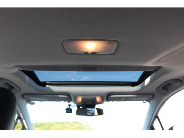 プリウス Ａプレミアム　禁煙車　寒冷地仕様　モデリスタエアロ　ＷＯＲＫ１９ｉｎホイール　サンルーフ　置くだけ充電　ＨＤＭＩ　ＵＳＢ　９型ナビ　前後ドライブレコーダー　レーダークルーズ　オートハイビーム　ＰＣＳ　安全装備搭載（24枚目）